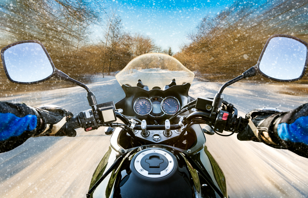 Winter riding in New Jersey showing icy road conditions from a motorcycle rider perspective